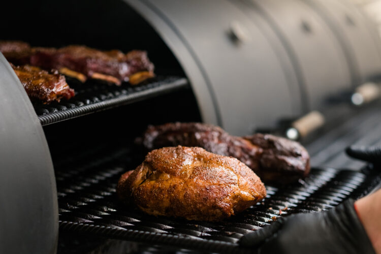 Choosing a Smoker vs Grill For Outdoor Cooking